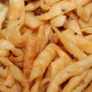Crunchy fried Bihari nimki served as a Holi festival snack