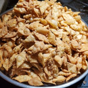 Home-fried Bihari nimki seasoned with ajwain and kalonji on a plate