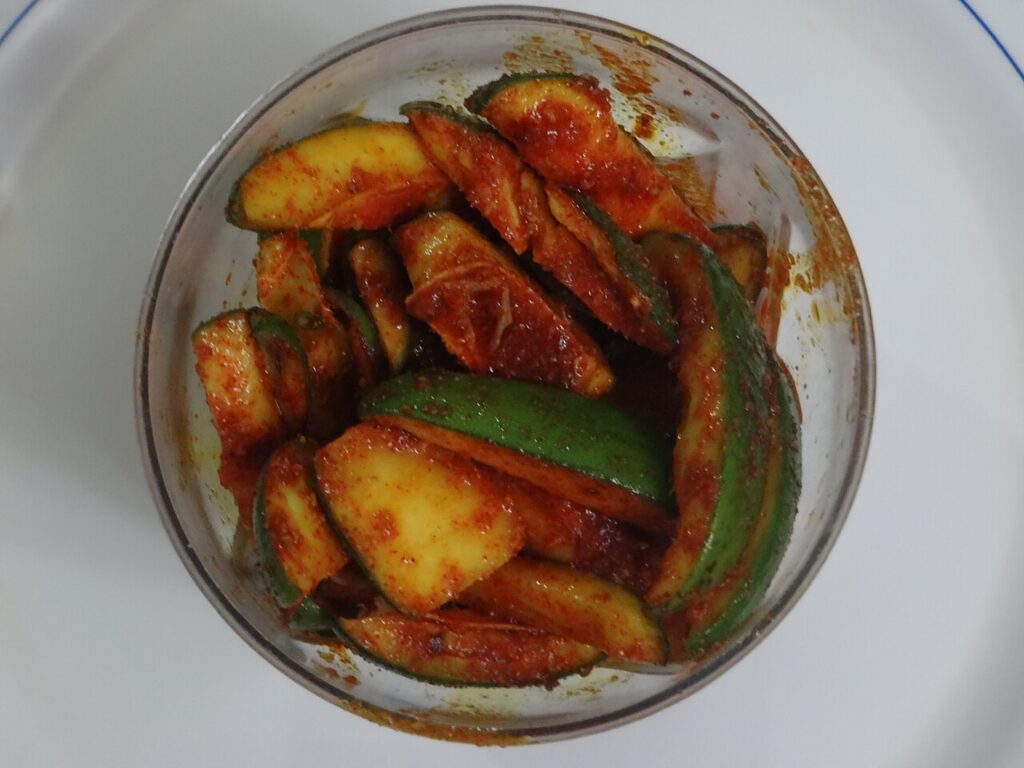 Spicy red chilli mango pickle in mustard oil