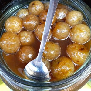Bihari aonla ka achar amla pickle in mustard oil in a bowl
