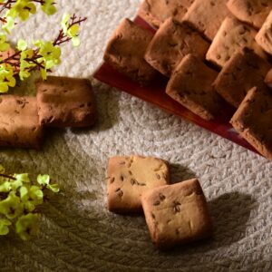 Gud Thekua - rustic home-style jaggery wheat snack pieces