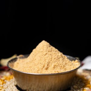 Gur sattu - roasted gram sattu flour on a bed of mixed grains and pulses, Magadh Bihar